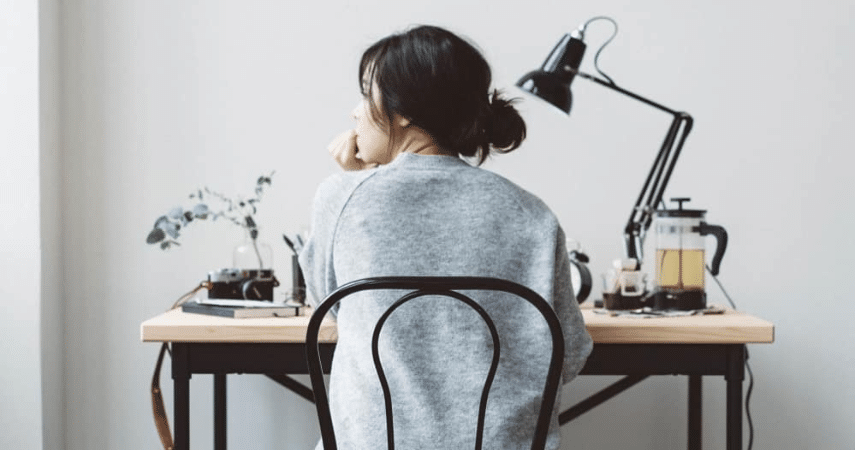 Anglepoise desk lamp and person